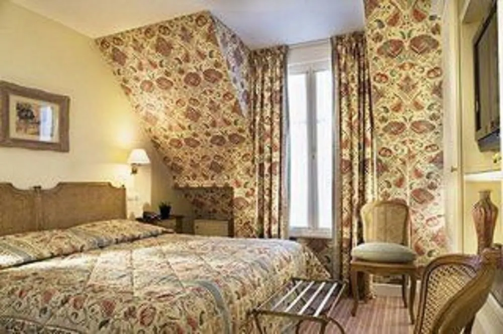 Отель Le Relais Madeleine Париж
